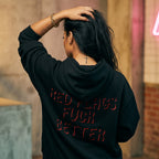 Pretty Toxic Red Flags F*ck Better (Red) Zip Hoodie, styled on a model