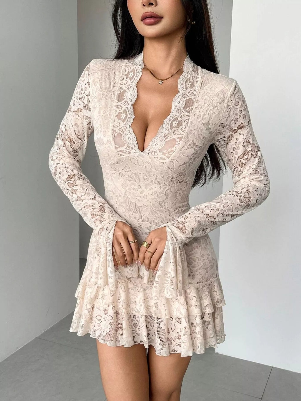 Pretty Toxic Lace Ruffle Hem Mini Dress, styled on a model