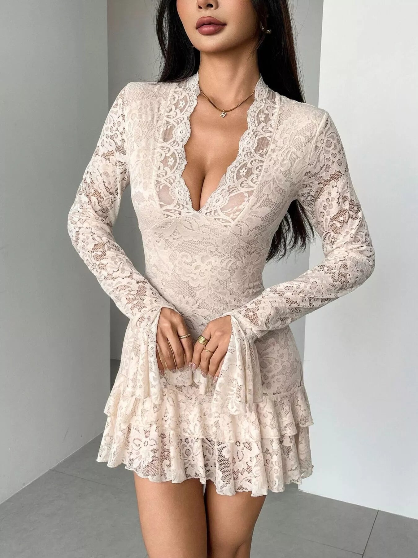 Pretty Toxic Lace Ruffle Hem Mini Dress, styled on a model